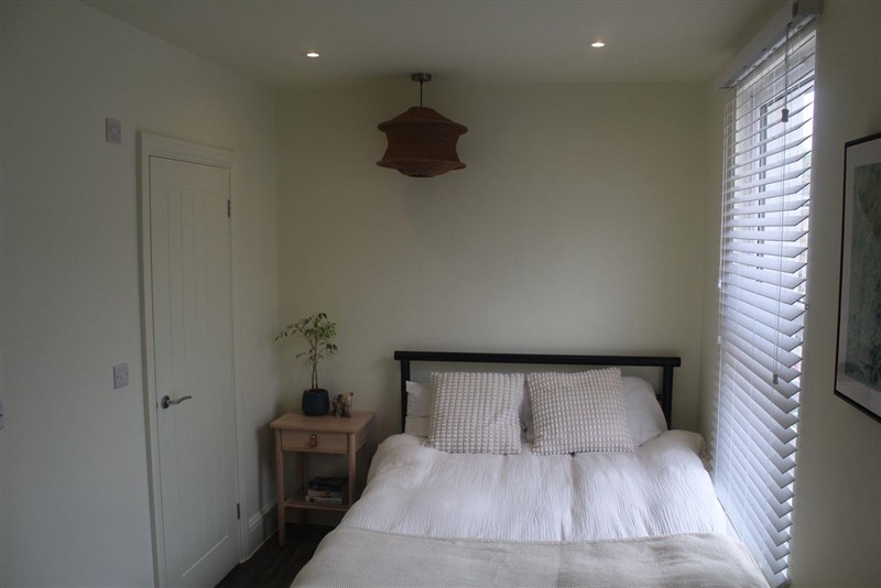 Bedroom with bedside furniture