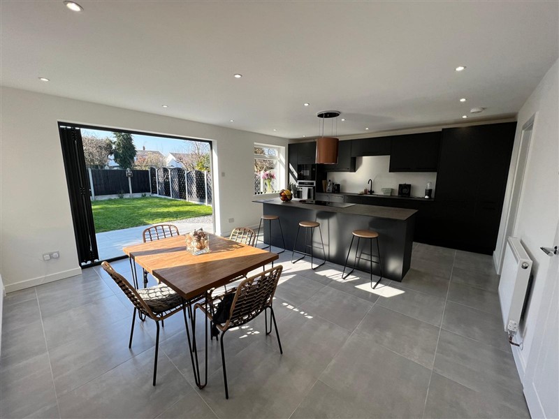 Kitchen and dining space opening to the garden