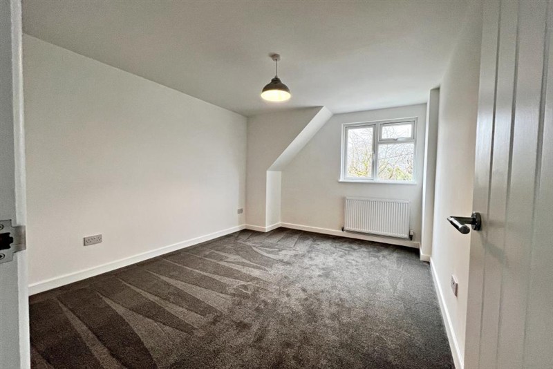 Newly finished carpeted room