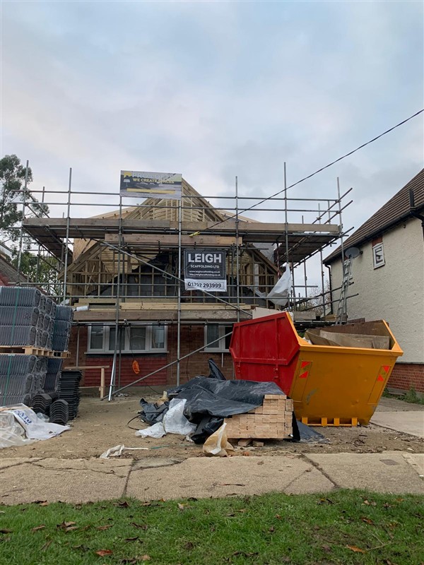 Scaffolded house and building materials
