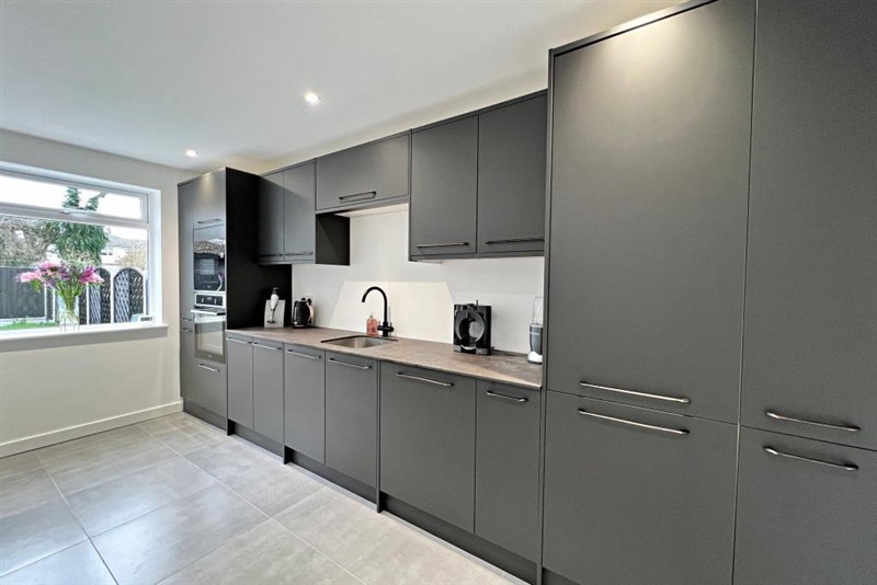 Kitchen with grey cabinetry