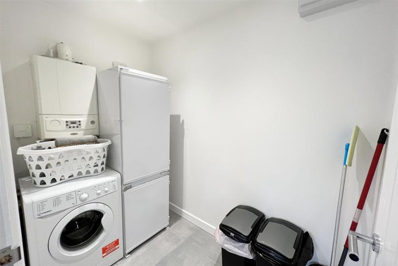 Utility room with laundry appliances