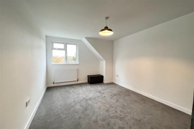Finished room with sloped ceiling