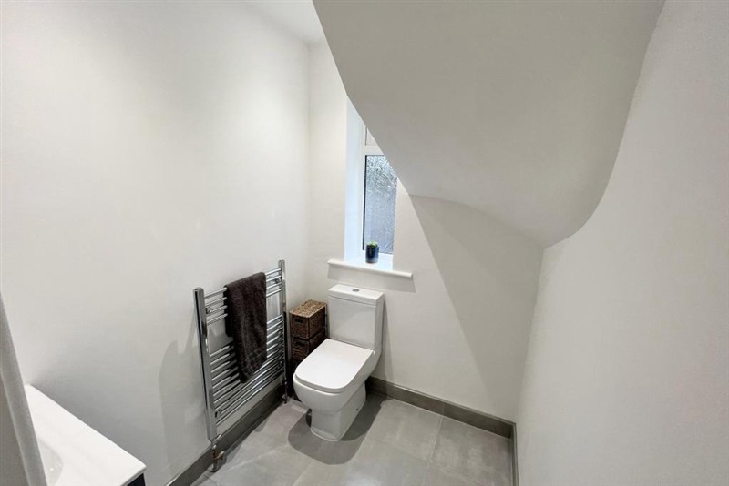 Bathroom beneath a sloping ceiling