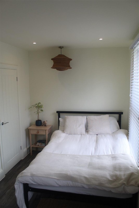 Bedroom with bedside lighting