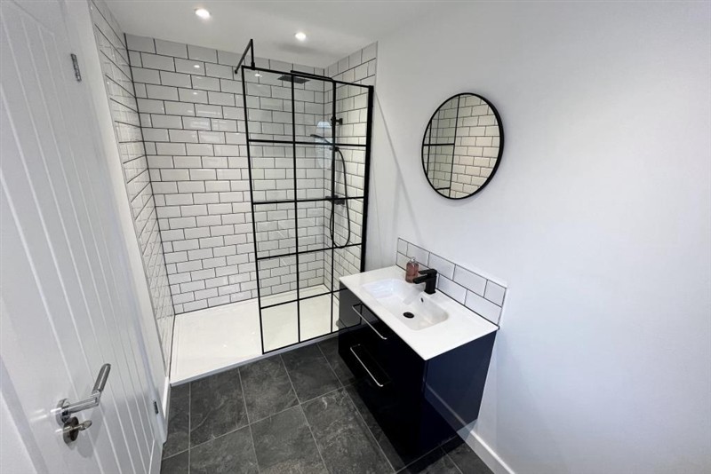 Tiled bathroom and vanity