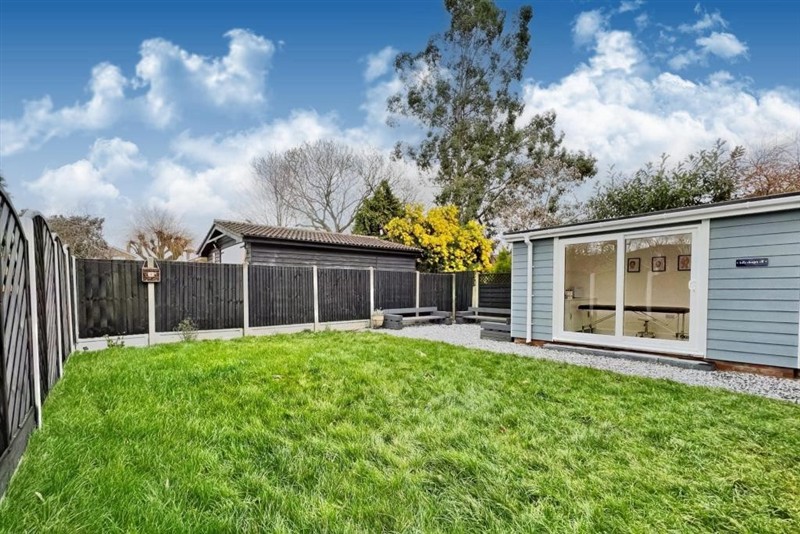 Garden room and landscaped lawn